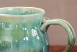 Hand thrown stoneware pottery mug Rainbow Trout green Barrel style